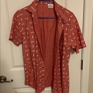 Coca Cola shirt.